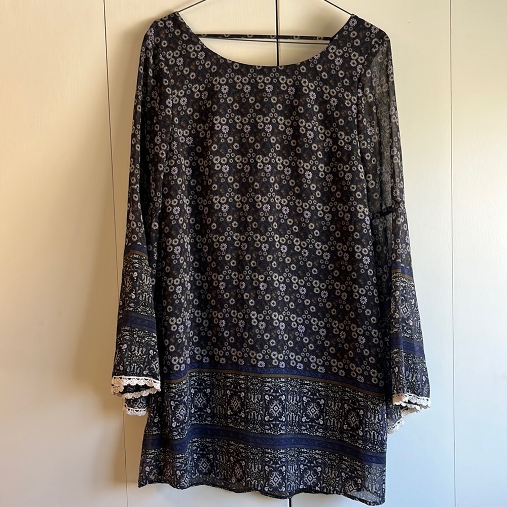 Long floral top with 3/4 bell sleeves